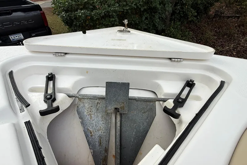 Slide: The Image of 2017 Sea Fox 226 Commander anchor storage compartment with open lid. - 25