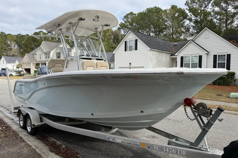 Slide: The Image of 2017 Sea Fox 226 Commander boat on trailer in suburban neighborhood. - 3