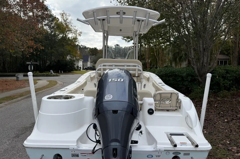Slide: The Image of 2017 Sea Fox 226 Commander boat with Yamaha 150 engine, parked on a residential street. - 5