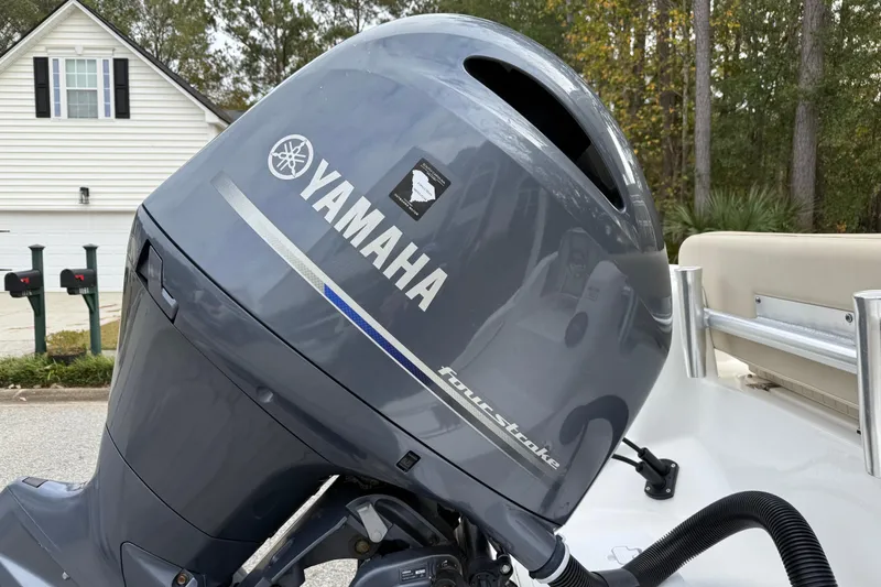Slide: The Image of Yamaha outboard motor on 2017 Sea Fox 226 Commander boat, residential background. - 7