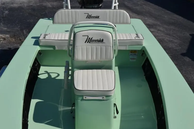 Slide: The Image of 2019 Maverick 18 HPX-V boat cruising on a calm river under a clear blue sky. - 4