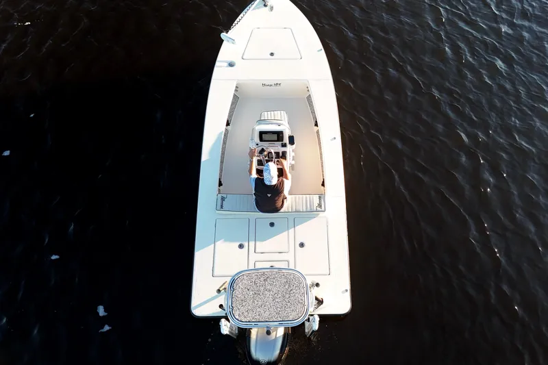 Slide: The Image of Overhead view of 2019 Maverick 18 HPX-V boat on dark water. - 41