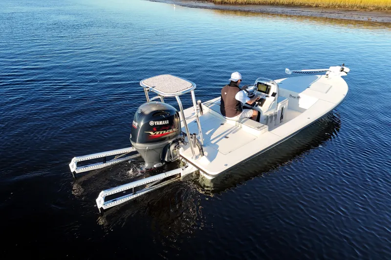 Slide: The Image of 2019 Maverick 18 HPX-V boat with Yamaha engine on calm water. - 43