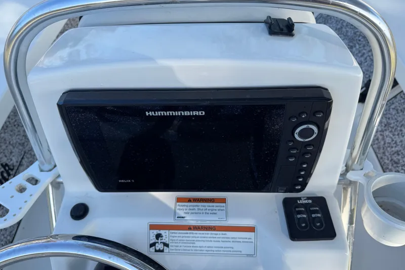 Slide: The Image of 2019 Maverick 18 HPX-V boat console with Humminbird Helix 5 fishfinder and Lenco controls. - 61