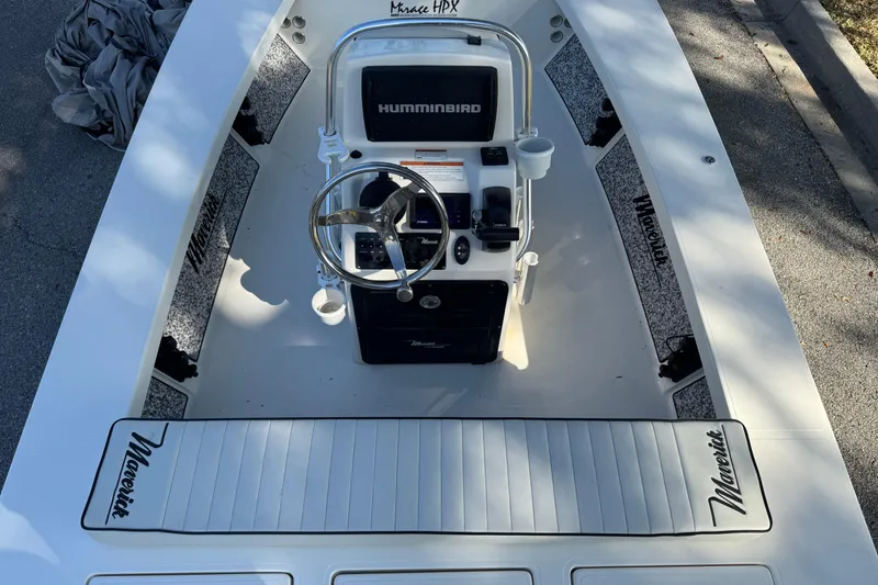 Slide: The Image of 2019 Maverick 18 HPX-V boat interior with steering console and Humminbird electronics. - 63