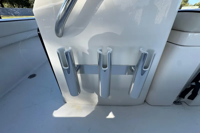 Slide: The Image of Rod holders on a 2019 Maverick 18 HPX-V boat deck. - 69