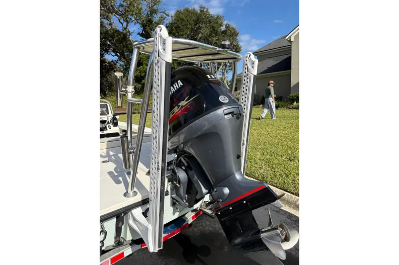 Slide: The Image of 2019 Maverick 18 HPX-V boat with Yamaha outboard motor on a trailer. - 71