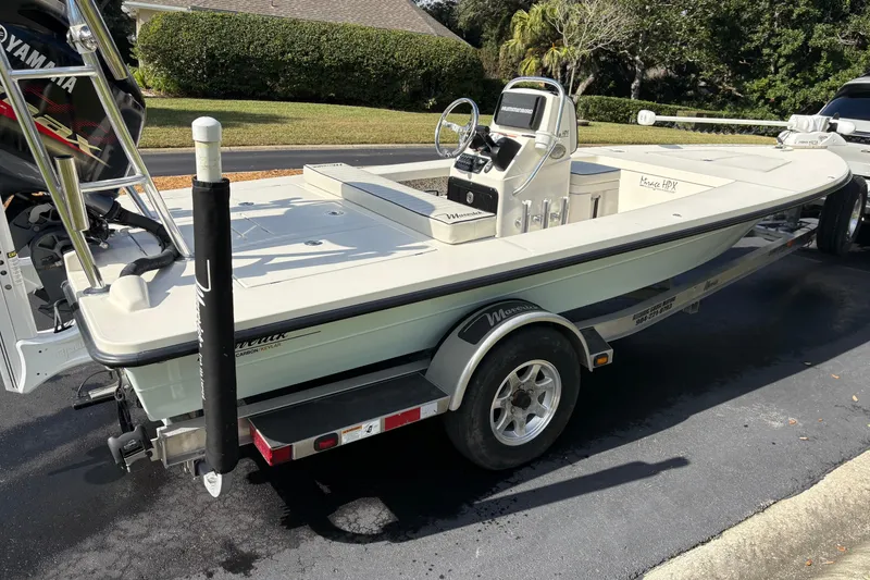 Slide: The Image of 2019 Maverick 18 HPX-V boat on trailer, parked in residential area. - 73