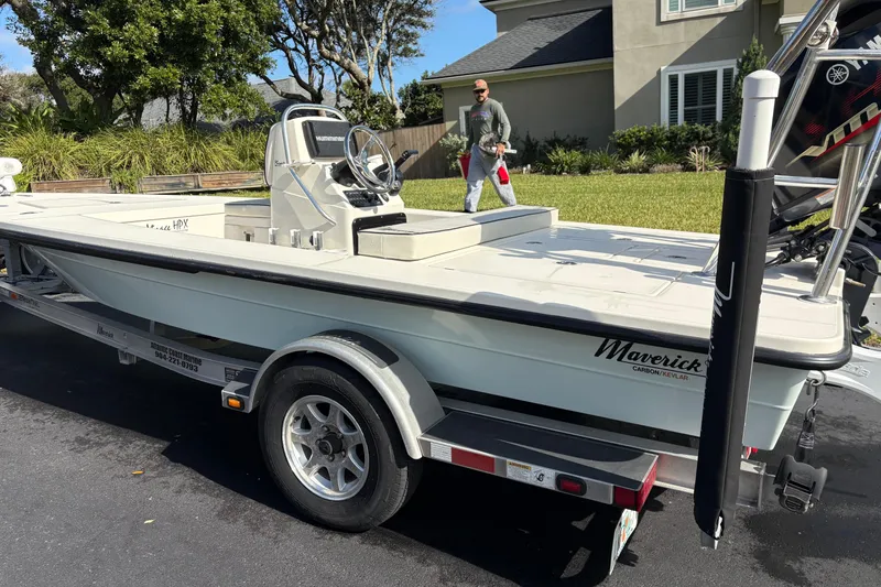 Slide: The Image of 2019 Maverick 18 HPX-V boat on trailer, parked in residential driveway. - 74