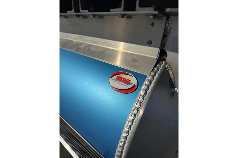 Slide: The Image of 2026 Bentley Pontoons Bolt 223, blue exterior with a red and silver emblem. - 8