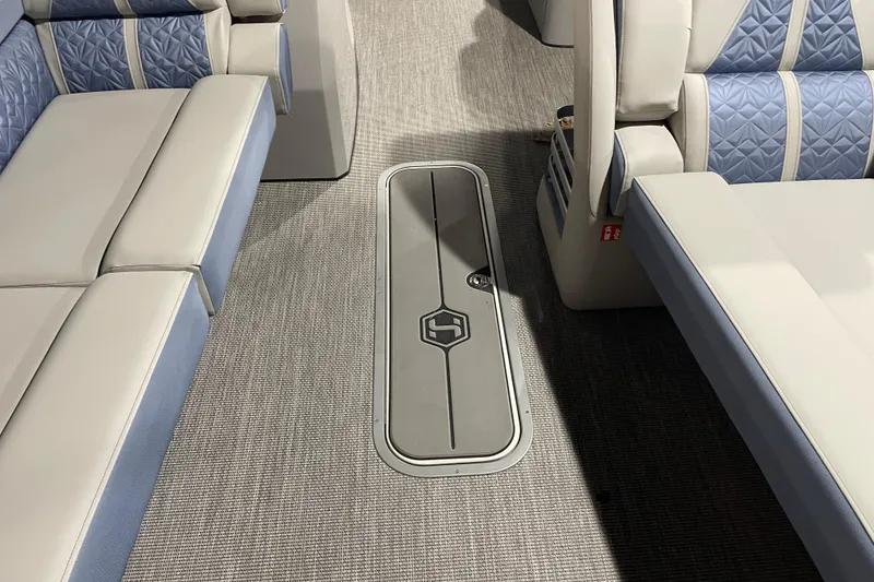Slide: The Image of Interior of 2026 Harris Grand Mariner SLEC 250 with luxurious seating and floor hatch. - 20