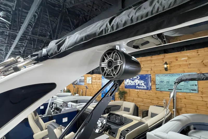 Slide: The Image of 2026 Harris Grand Mariner SLEC 250 interior with speaker and seating details. - 32