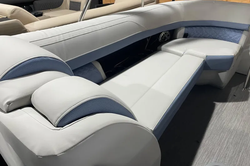 Slide: The Image of Luxurious seating on 2026 Harris Grand Mariner SEL 250 pontoon boat, featuring elegant upholstery. - 4