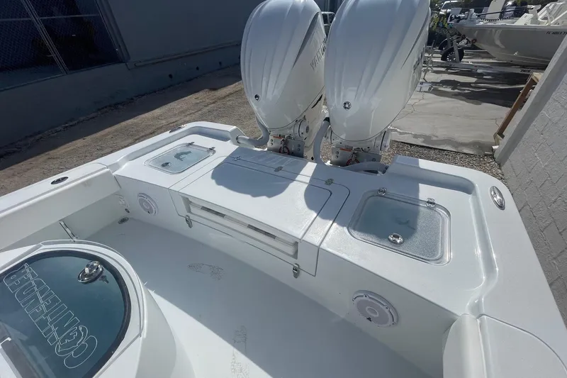 Slide: The Image of Interior view of 2026 Contender 29 Bay boat, featuring rod holders and seating. - 8