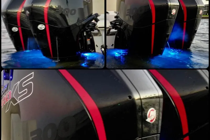 Slide: The Image of 2022 Key West 263 FS boat with dual Mercury 300 engines, featuring blue underwater lights. - 4