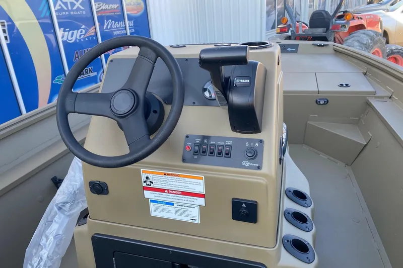 Slide: The Image of 2026 G3 Gator Tough 18 CC boat console with steering wheel and controls. - 7
