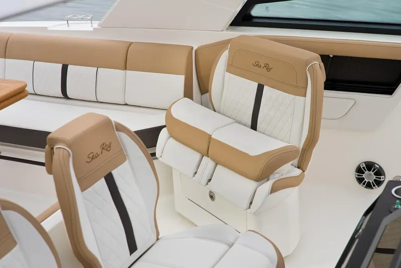 Slide: The Image of 2021 Sea Ray SLX 400 boat interior with Kenyon control panels and power outlets. - 10