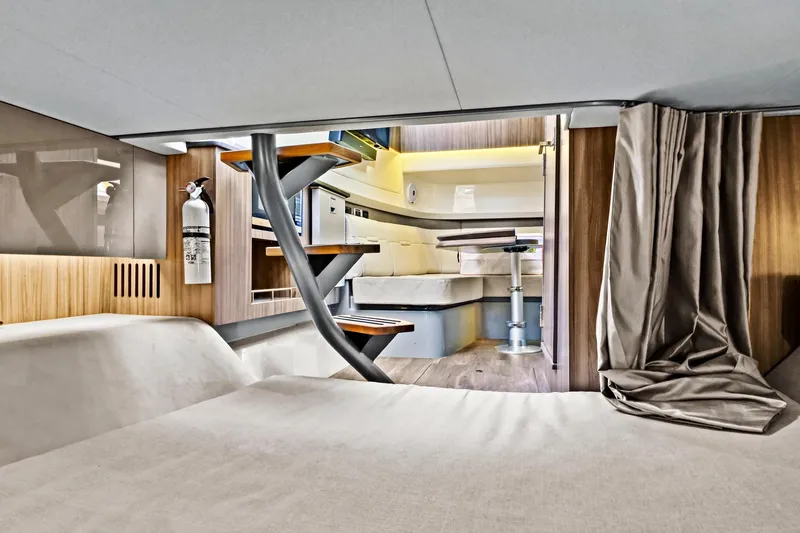 Slide: The Image of Interior of 2021 Sea Ray SLX 400 yacht, featuring modern design and cozy seating area. - 37