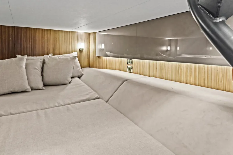 Slide: The Image of Luxurious interior cabin of 2021 Sea Ray SLX 400 yacht with plush bedding. - 42