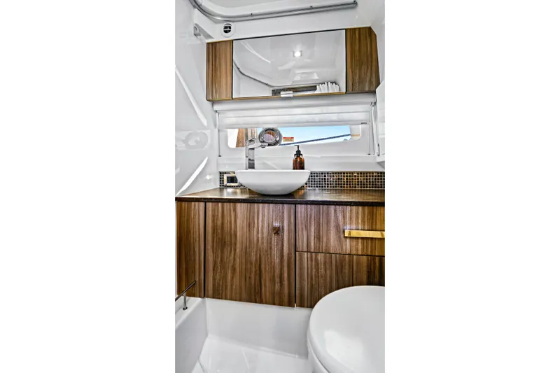 Slide: The Image of Luxurious bathroom interior of 2021 Sea Ray SLX 400 yacht with modern fixtures. - 46