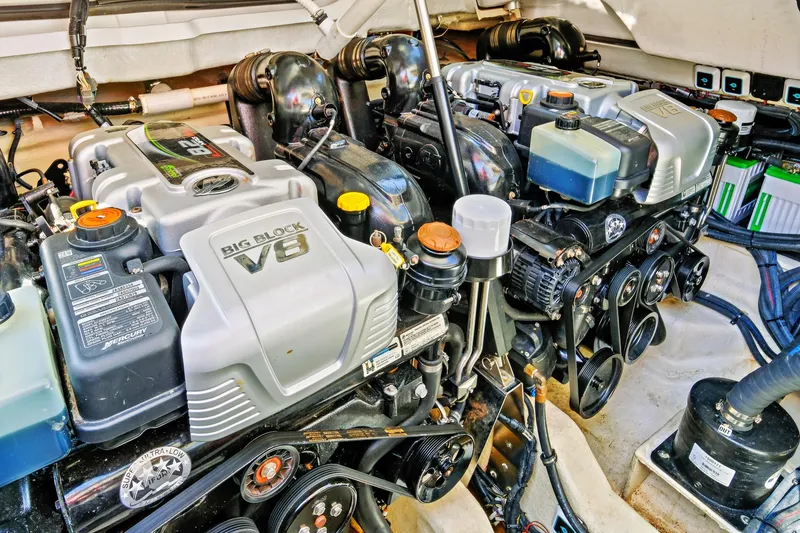 Slide: The Image of Engine room of 2021 Sea Ray SLX 400 with dual Big Block V8 engines. - 48