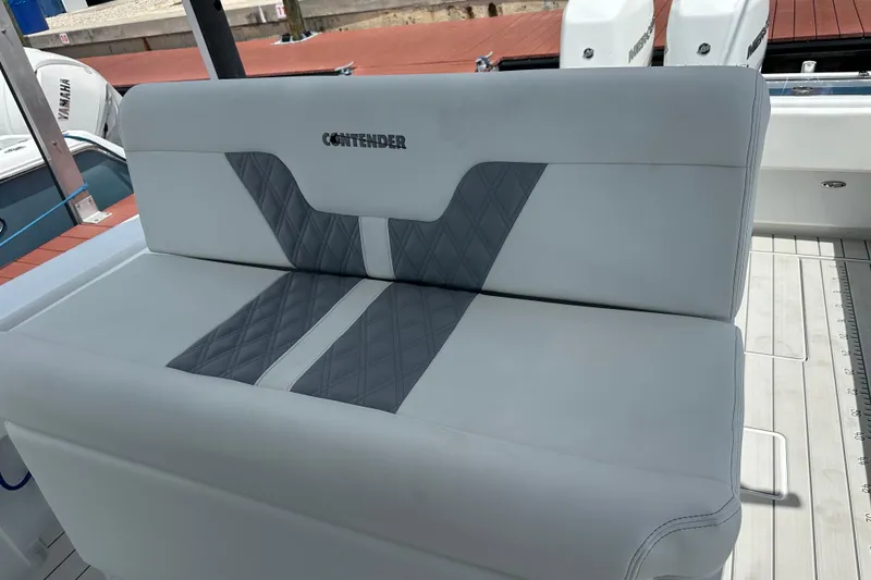 Slide: The Image of Contender 35 ST 2019 boat seat with gray and white upholstery design. - 17