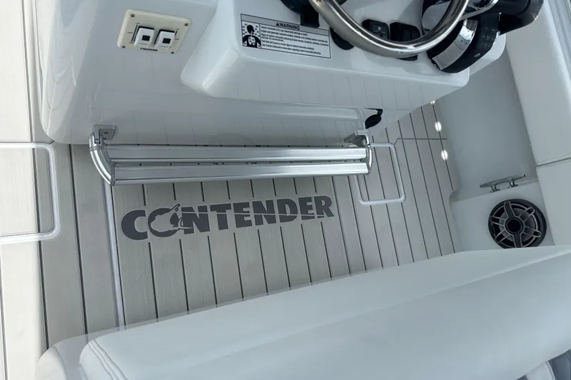 Slide: The Image of 2019 Contender 35 ST boat interior with logo on deck flooring. - 18