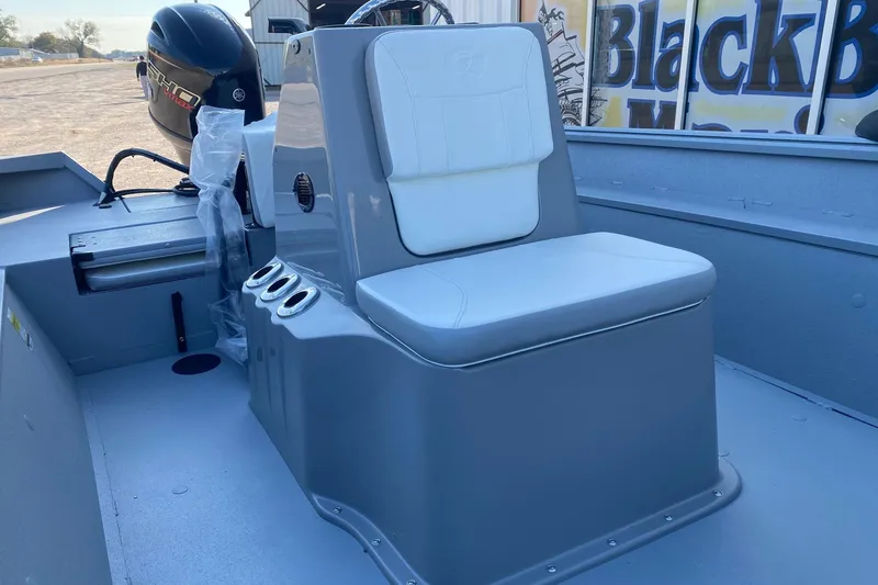 Slide: The Image of 2026 G3 Bay 20 boat interior with seating and Yamaha engine. - 12