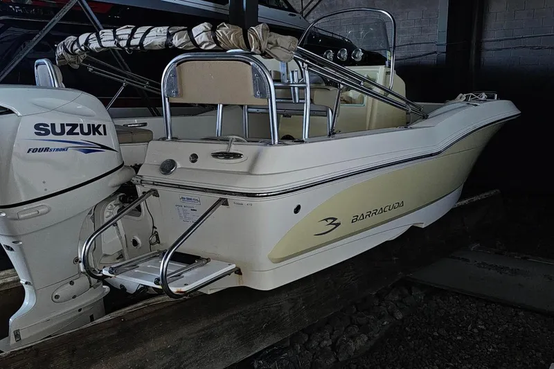 Slide: The Image of 2016 Barracuda 188 CCR boat with Suzuki Four Stroke engine in storage. - 5