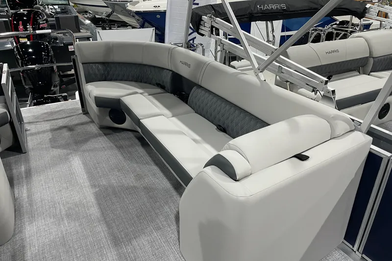 Slide: The Image of Luxurious seating on 2026 Harris Cruiser 230 CW pontoon boat, featuring elegant upholstery. - 9