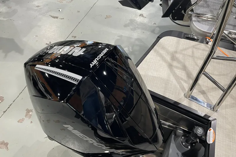 Slide: The Image of 2026 Harris SUNLINER 230 SLDH with Mercury outboard motor on display. - 14