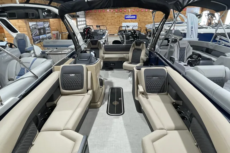 Slide: The Image of Luxurious interior of 2026 Harris SUNLINER 230 SLDH pontoon boat in showroom. - 24