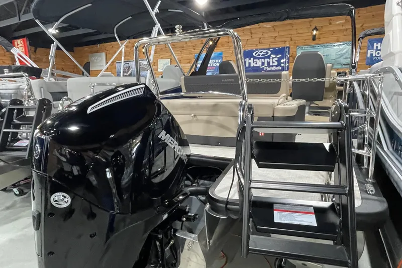 Slide: The Image of 2026 Harris SUNLINER 230 SLDH pontoon boat with Mercury engine in showroom. - 26