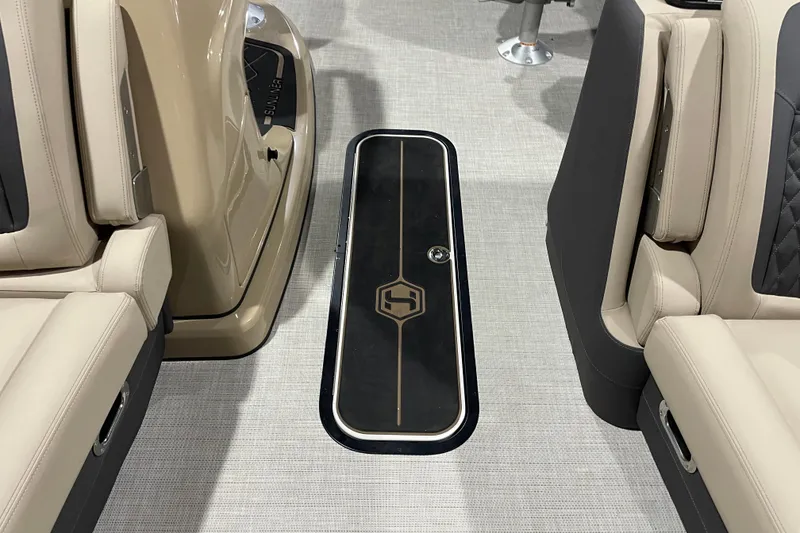 Slide: The Image of 2026 Harris SUNLINER 230 SLDH boat interior with beige seating and sleek flooring. - 6