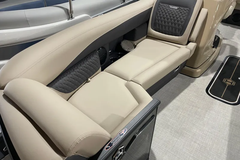 Slide: The Image of Luxurious seating on 2026 Harris SUNLINER 230 SLDH boat, featuring beige and black upholstery. - 7