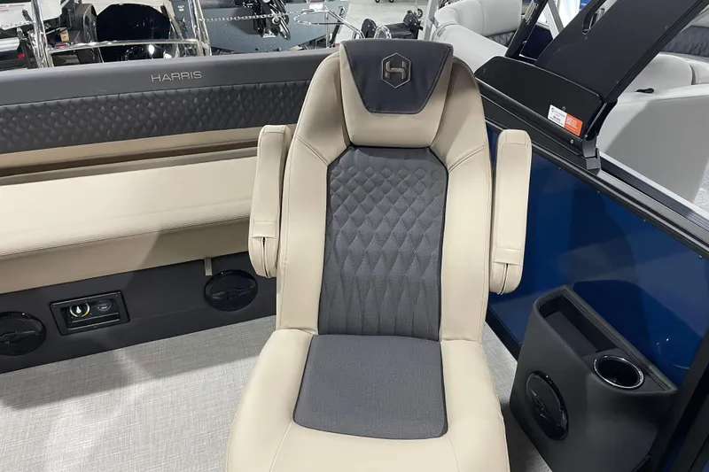 Slide: The Image of 2026 Harris SUNLINER 230 SLDH boat interior with luxurious seating and modern design. - 9