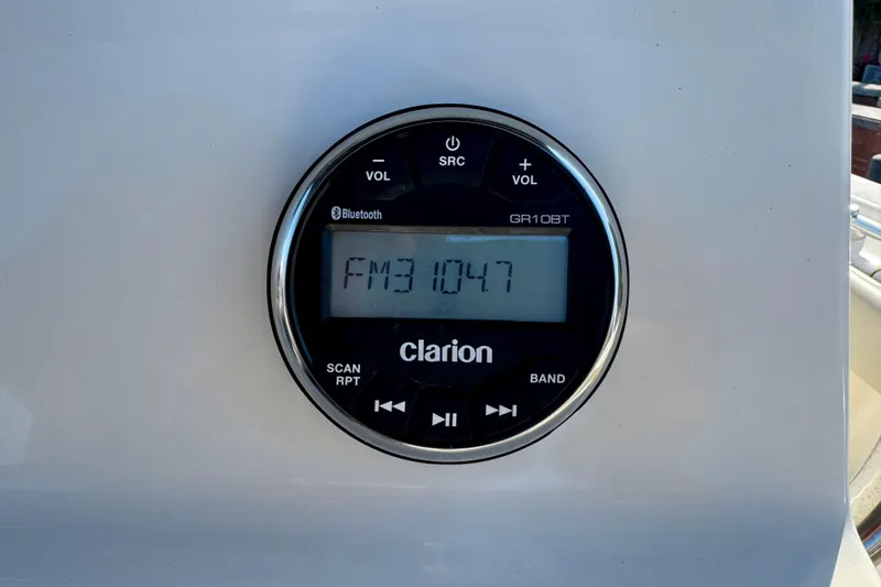 Slide: The Image of Clarion GR10BT radio display on 2023 Key West 239 FS boat dashboard. - 19