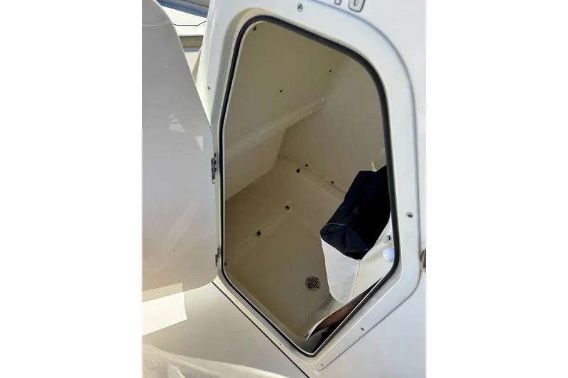 Slide: The Image of Open storage compartment in 2023 Key West 239 FS boat. - 34