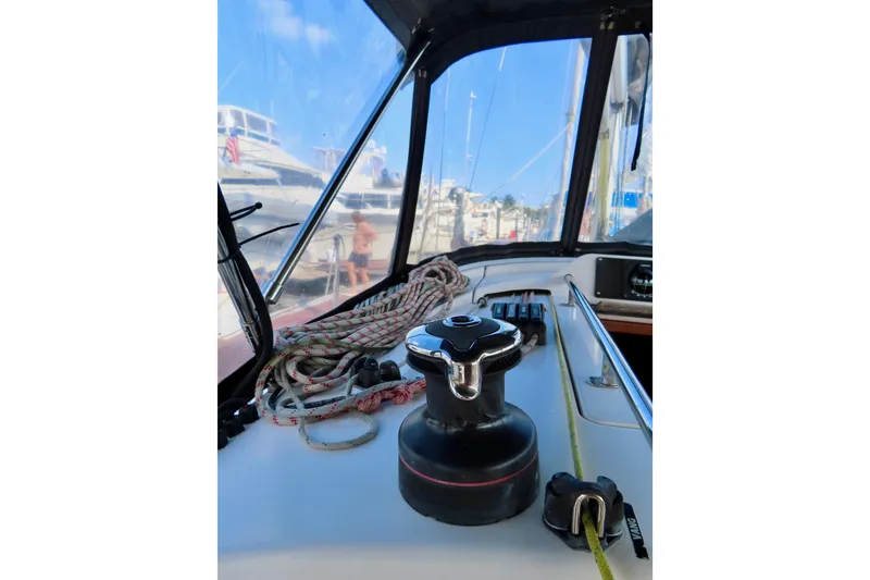 Slide: The Image of Cockpit view of 2015 Salona 35 sailboat with winch and ropes. - 13