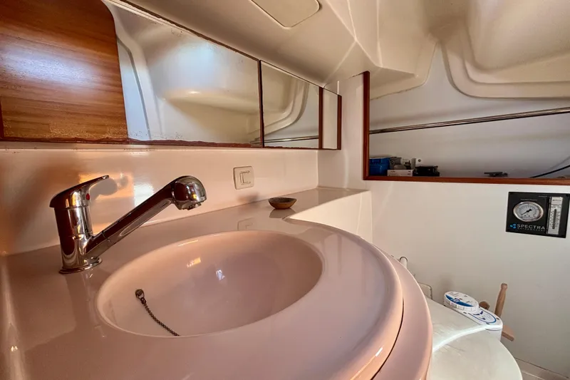Slide: The Image of Interior of 2015 Salona 35 yacht bathroom with sink and mirror. - 29