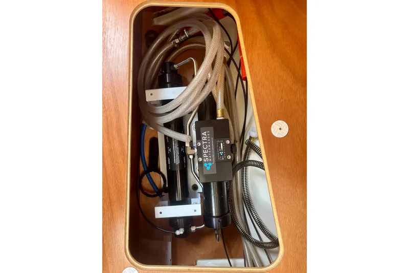 Slide: The Image of Water filtration system inside 2015 Salona 35 yacht compartment. - 34