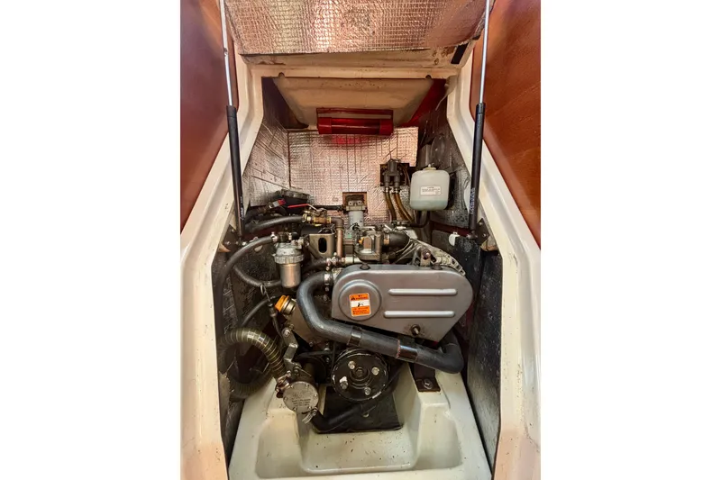 Slide: The Image of Engine compartment of a 2015 Salona 35 sailboat, showcasing mechanical components. - 38