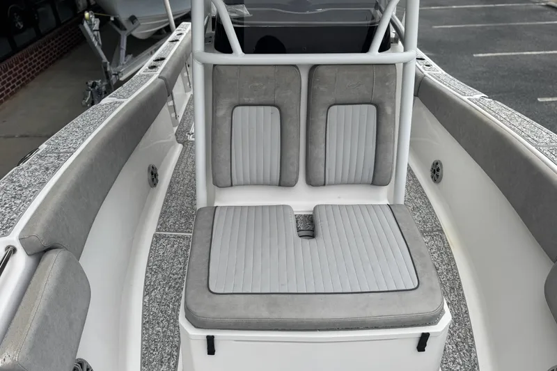Slide: The Image of 2018 Sea Fox 268 Commander boat interior with gray cushioned seating. - 10