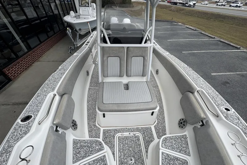 Slide: The Image of 2018 Sea Fox 268 Commander boat interior with cushioned seating and spacious deck. - 11