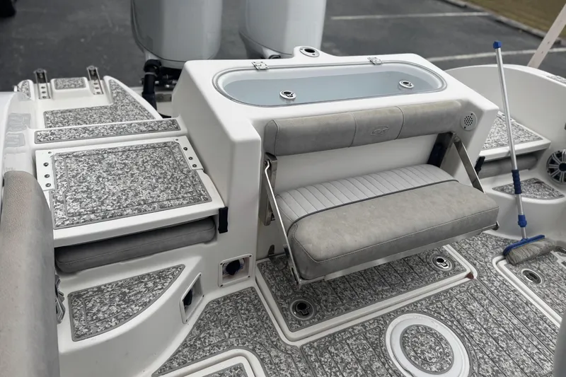 Slide: The Image of 2018 Sea Fox 268 Commander boat interior with foldable seat and textured flooring. - 12