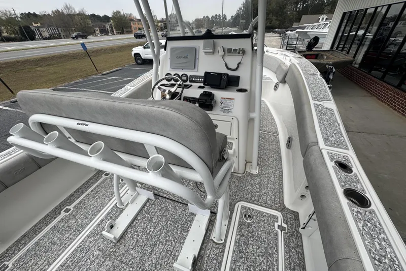 Slide: The Image of 2018 Sea Fox 268 Commander boat interior with helm, seating, and rod holders. - 13