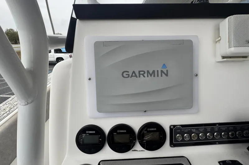 Slide: The Image of 2018 Sea Fox 268 Commander dashboard with Garmin display and Yamaha gauges. - 17