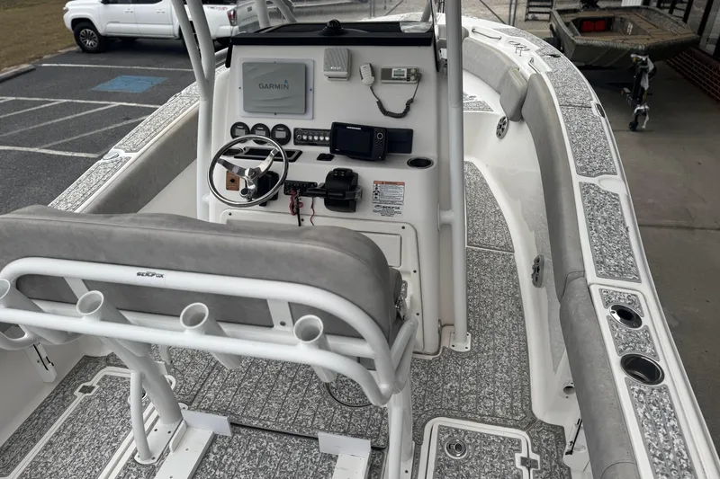 Slide: The Image of 2018 Sea Fox 268 Commander boat interior with steering console and seating. - 7