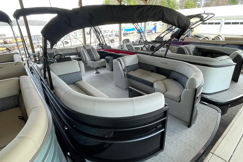 The Image of 2026 Harris Cruiser 230 pontoon boat with luxurious seating and modern design. - 0