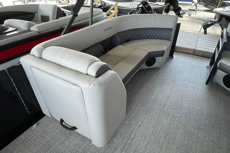 Slide: The Image of 2026 Harris Cruiser 230 boat interior with luxurious seating and modern design. - 2